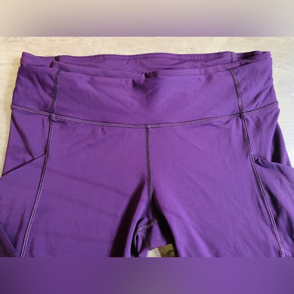 Size 10 lululemon mesh legging. Purple Mesh Crossover Back Stash Pocket Mid Rise - Picture 6 of 14